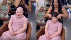 “Ha ritrovato la sua autostima”: una bambina affetta da alopecia riceve la sua prima parrucca e quando si guarda allo specchio non smette di sorridere (VIDEO)