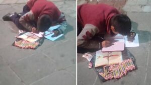 Fa i compiti in strada mentre vende caramelle, ma tutti lo ignorano